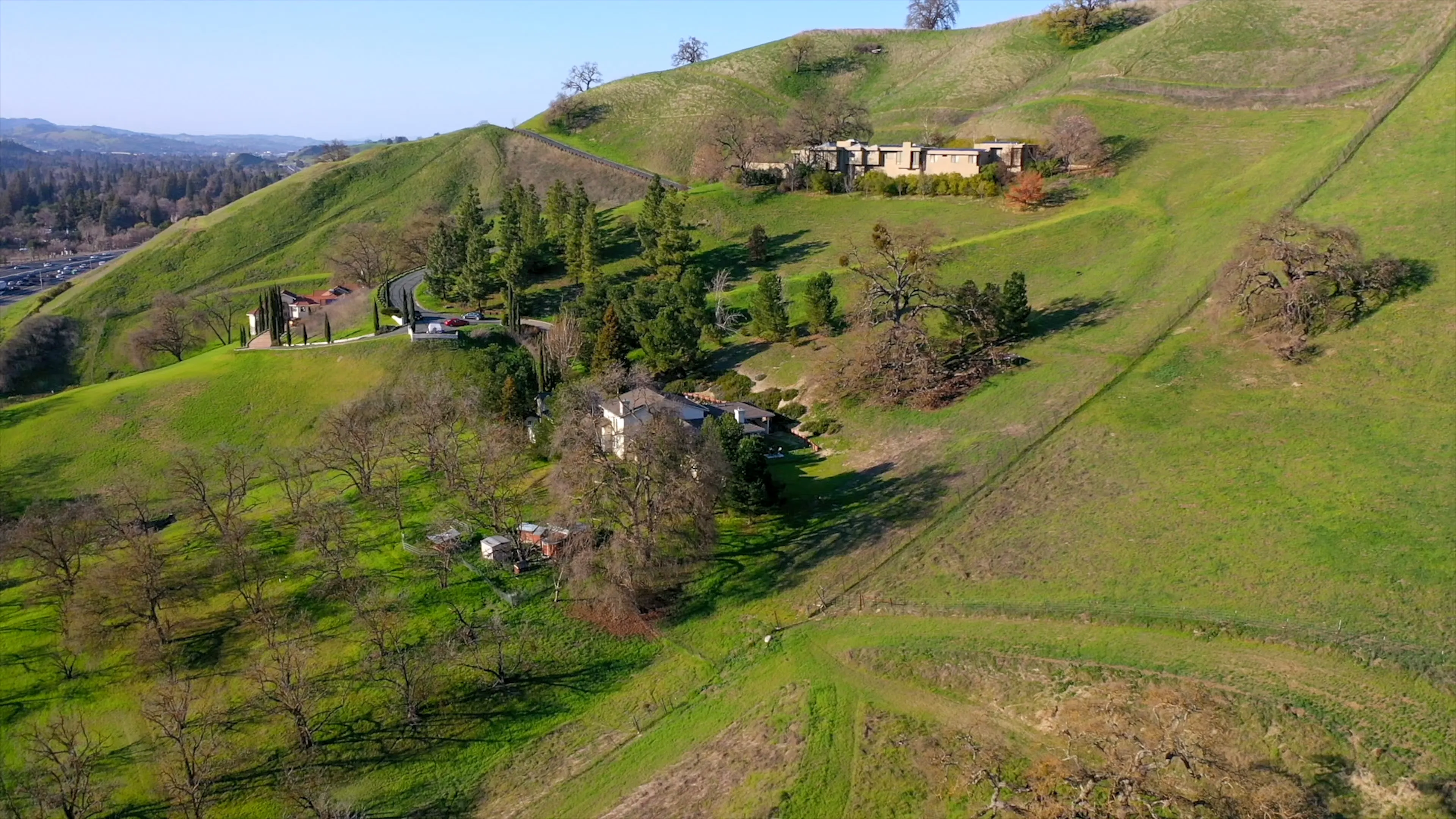 An aerial view of homes and hills in Alamo, CA