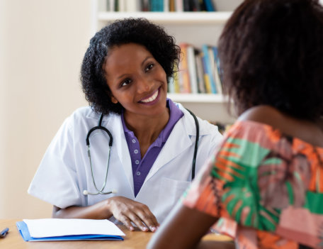 female doctor consulted by her patient