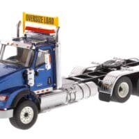 A blue truck with the words " oversize land ".