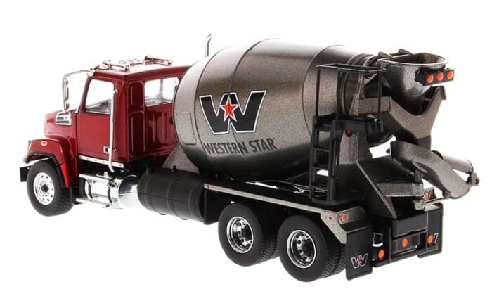 A cement truck with the western star logo on it.