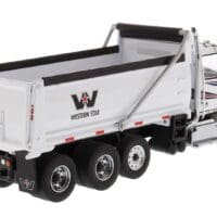 A white dump truck with the western star logo on it.