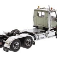 A truck is parked in the middle of the road.