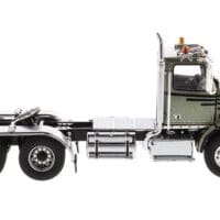 A truck is parked in the middle of the road.
