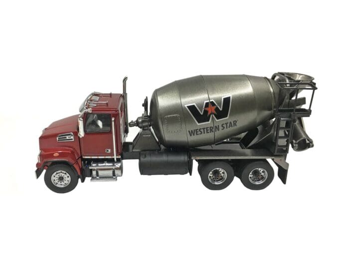 A cement truck with the western star logo on it.