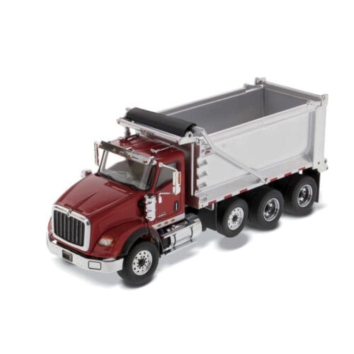 A red dump truck with a white trailer.