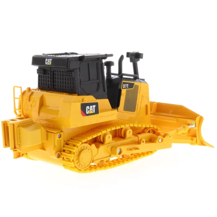 A yellow and black cat bulldozer is on the ground.