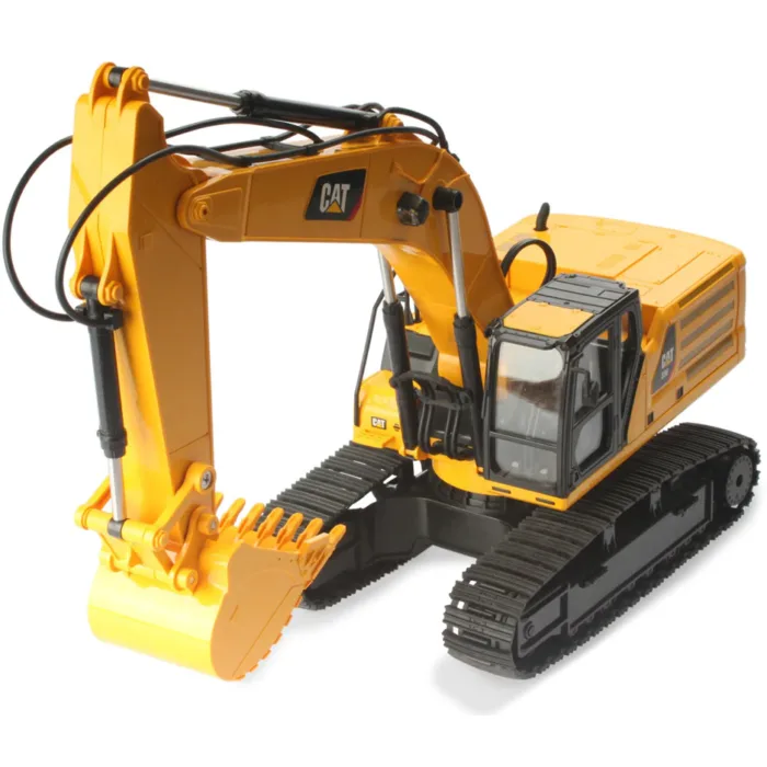 A yellow and black toy excavator is on the floor